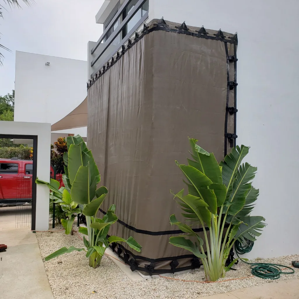Tan storm screen on modern white house